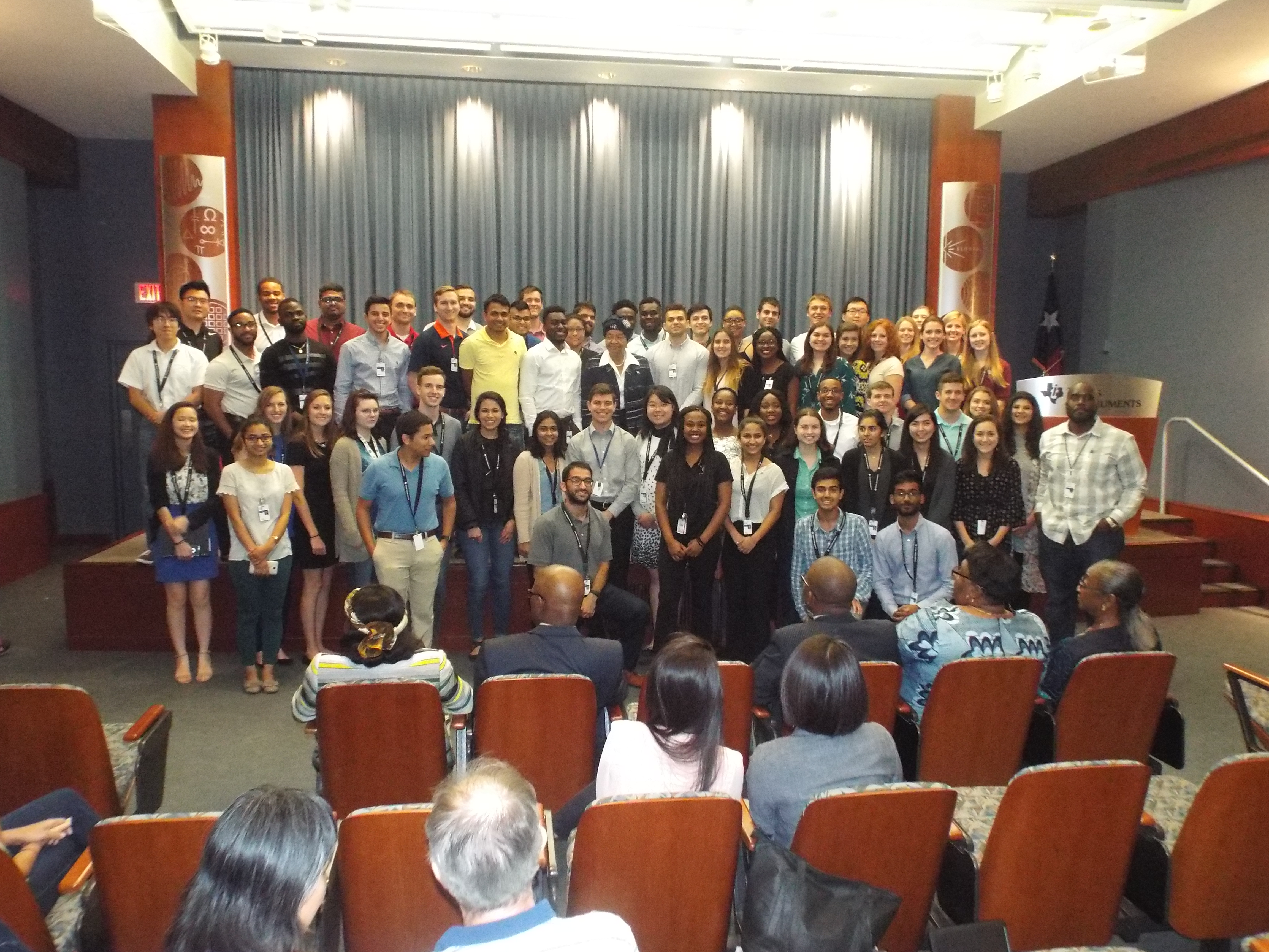 President Sirleaf poses with interns following interactive discussion at Texas Instruments